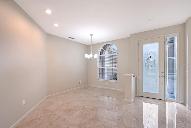 5080 Timber Chase Way, Sarasota, FL 34238 - foyer entrance featuring a chandelier and recessed lighting