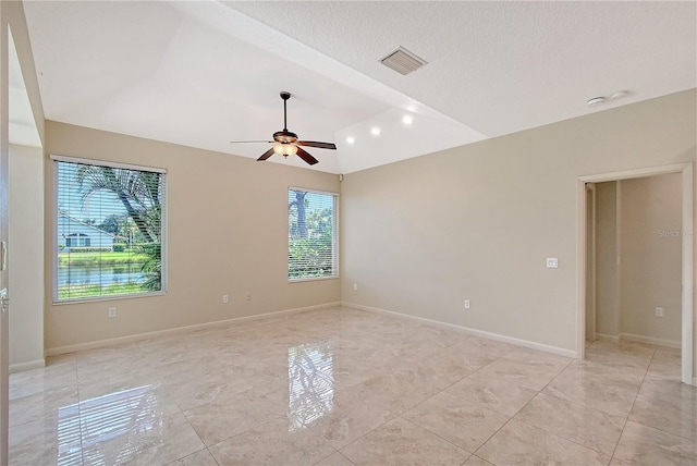 5080 Timber Chase Way, Sarasota, FL 34238 - unfurnished room featuring a ceiling fan, lofted ceiling, light tile patterned floors, and a smoke detector