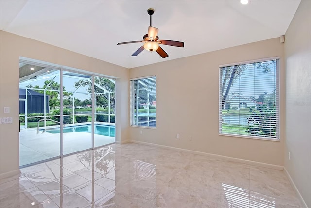 5080 Timber Chase Way, Sarasota, FL 34238 - spare room featuring a ceiling fan and baseboards