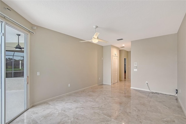 5080 Timber Chase Way, Sarasota, FL 34238 - empty room with ceiling fan and a textured ceiling