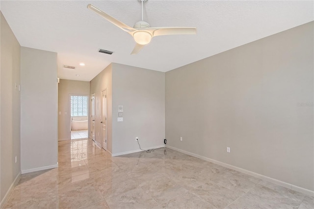 5080 Timber Chase Way, Sarasota, FL 34238 - spare room featuring a ceiling fan, recessed lighting, and light marble finish floors