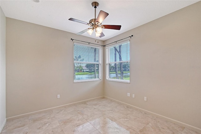 5080 Timber Chase Way, Sarasota, FL 34238 - spare room featuring baseboards and ceiling fan