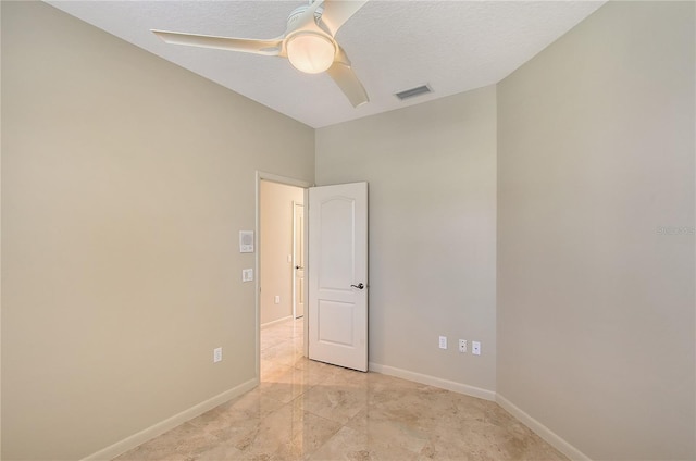 5080 Timber Chase Way, Sarasota, FL 34238 - spare room with a ceiling fan and baseboards