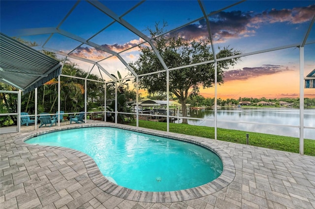 220 39th St NE, Bradenton, FL 34208 - swimming pool with a water view, a patio, and a lanai