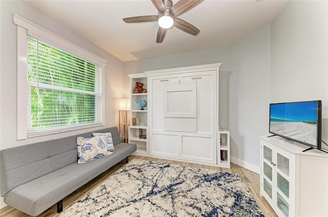 220 39th St NE, Bradenton, FL 34208 - living area featuring light wood finished floors and ceiling fan