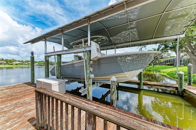 220 39th St NE, Bradenton, FL 34208 - dock featuring boat lift and a water view
