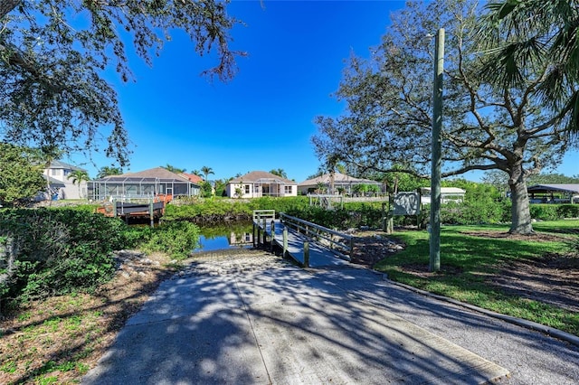 220 39th St NE, Bradenton, FL 34208 - view of street featuring a boat ramp, a residential view, and a water view