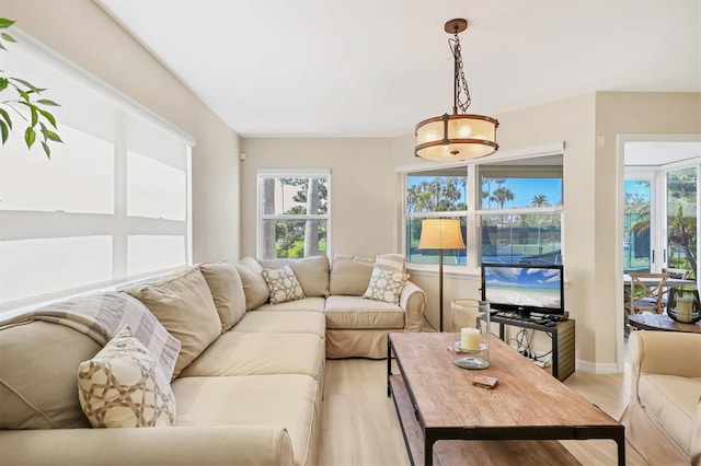 1240 Siesta Bayside Dr Unit 1240C, Sarasota, FL 34242 - living area featuring light wood-style flooring