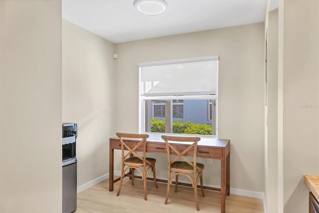 1240 Siesta Bayside Dr Unit 1240C, Sarasota, FL 34242 - dining space with light wood finished floors and baseboards