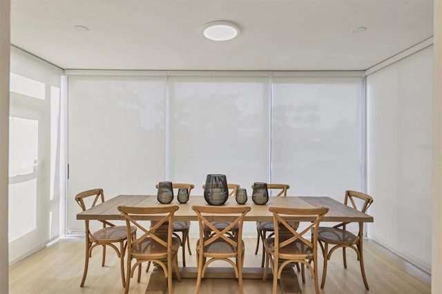 1240 Siesta Bayside Dr Unit 1240C, Sarasota, FL 34242 - dining area featuring light wood-type flooring