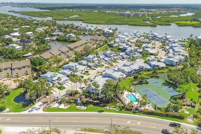 1240 Siesta Bayside Dr Unit 1240C, Sarasota, FL 34242 - aerial view of property and surrounding area with a large body of water and nearby suburban area
