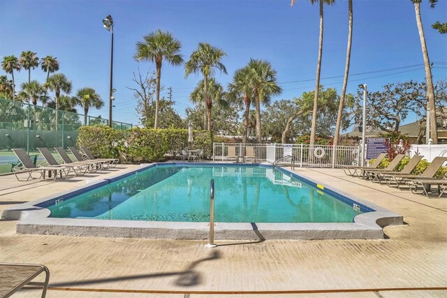 1240 Siesta Bayside Dr Unit 1240C, Sarasota, FL 34242 - community pool with a patio area