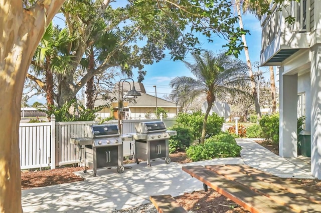 1240 Siesta Bayside Dr Unit 1240C, Sarasota, FL 34242 - patio / terrace featuring a patio and grilling area