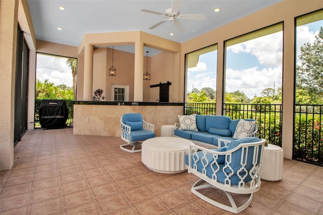 550 Dove Pointe, Osprey, FL 34229 - sunroom / solarium with a ceiling fan and outdoor lounge area