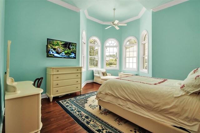 550 Dove Pointe, Osprey, FL 34229 - bedroom featuring crown molding, dark wood finished floors, and a ceiling fan