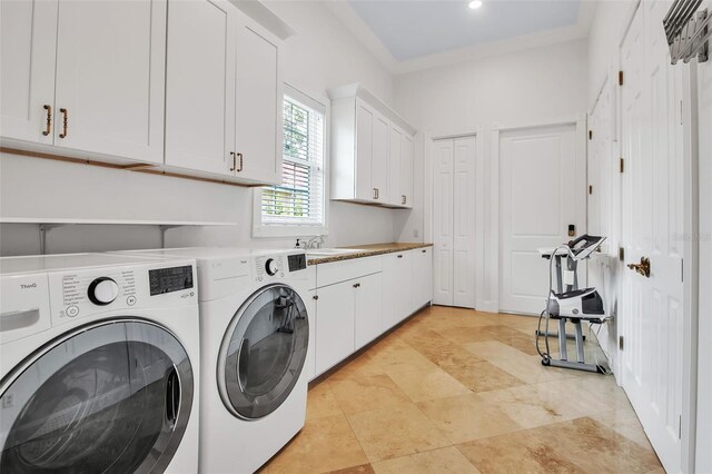 550 Dove Pointe, Osprey, FL 34229 - laundry room featuring washer and dryer and cabinet space