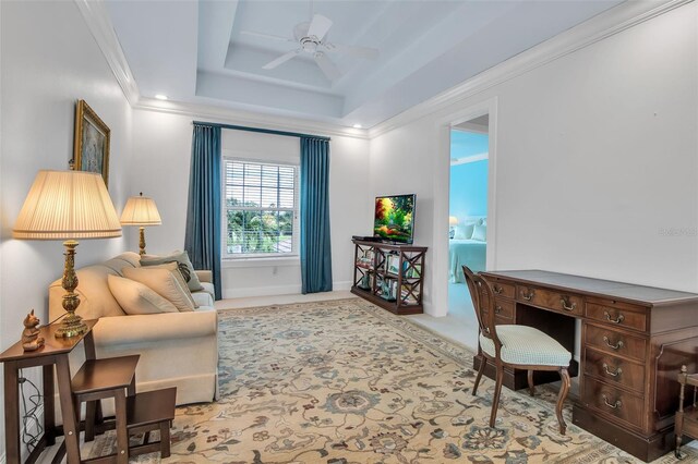 550 Dove Pointe, Osprey, FL 34229 - carpeted office space featuring a tray ceiling, a ceiling fan, and crown molding