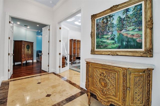 550 Dove Pointe, Osprey, FL 34229 - hall with inlaid floor details, crown molding, and recessed lighting