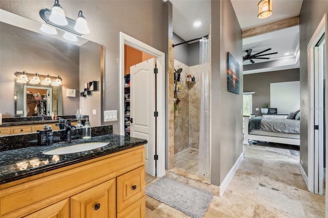 15780 Wilson Rd, Sarasota, FL 34240 - ensuite bathroom featuring a shower stall, vanity, and ceiling fan