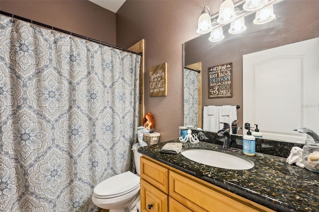 15780 Wilson Rd, Sarasota, FL 34240 - bathroom featuring a textured wall and vanity