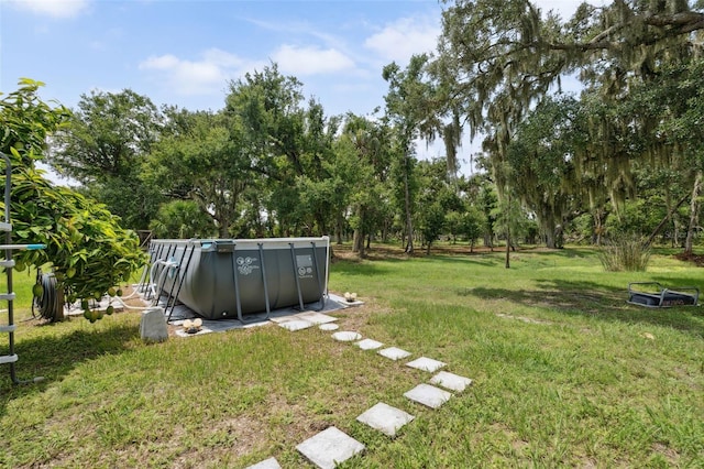 15780 Wilson Rd, Sarasota, FL 34240 - view of green lawn featuring view of wooded area