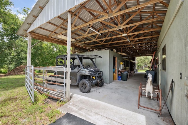 15780 Wilson Rd, Sarasota, FL 34240 - view of parking / parking lot with a carport