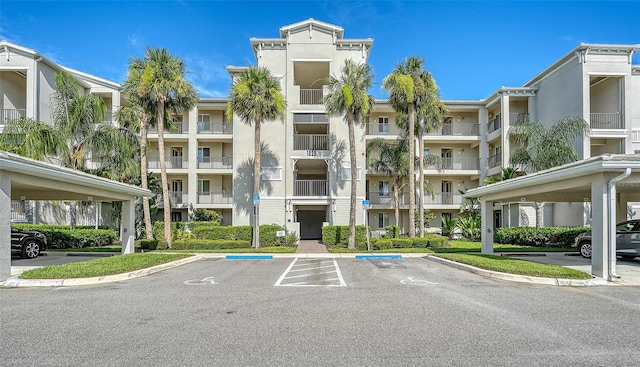 1030 Tidewater Shores Loop Unit 307, Bradenton, FL 34208 - view of apartment building / complex with uncovered parking