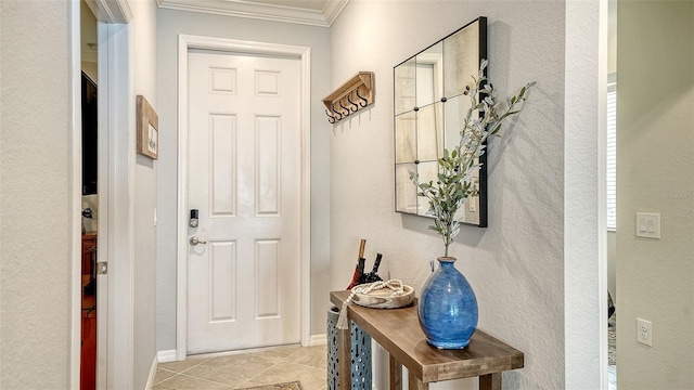 1030 Tidewater Shores Loop Unit 307, Bradenton, FL 34208 - entrance foyer featuring crown molding and light tile patterned flooring