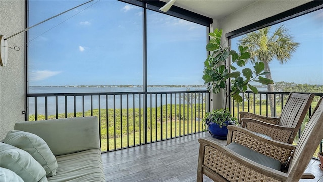 1030 Tidewater Shores Loop Unit 307, Bradenton, FL 34208 - sunroom / solarium featuring a water view and healthy amount of natural light
