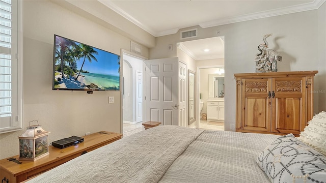 1030 Tidewater Shores Loop Unit 307, Bradenton, FL 34208 - bedroom featuring crown molding and ensuite bathroom