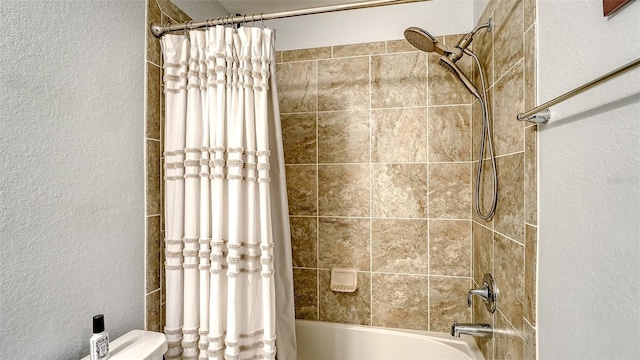 1030 Tidewater Shores Loop Unit 307, Bradenton, FL 34208 - bathroom with shower / bath combo and a textured wall