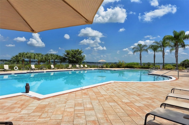 1030 Tidewater Shores Loop Unit 307, Bradenton, FL 34208 - community pool with a patio