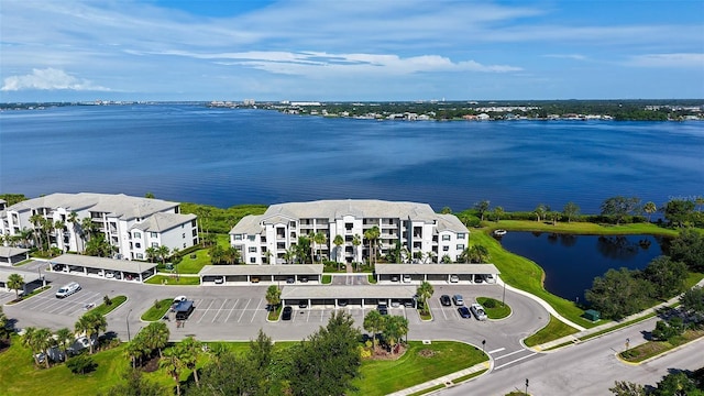 1030 Tidewater Shores Loop Unit 307, Bradenton, FL 34208 - aerial view of a large body of water and apartment complex