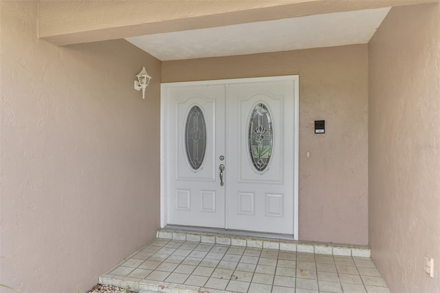 5124 Palm Aire Dr, Sarasota, FL 34243 - entrance to property featuring stucco siding
