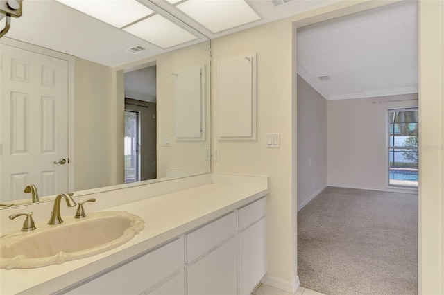 5124 Palm Aire Dr, Sarasota, FL 34243 - bathroom with vanity and crown molding