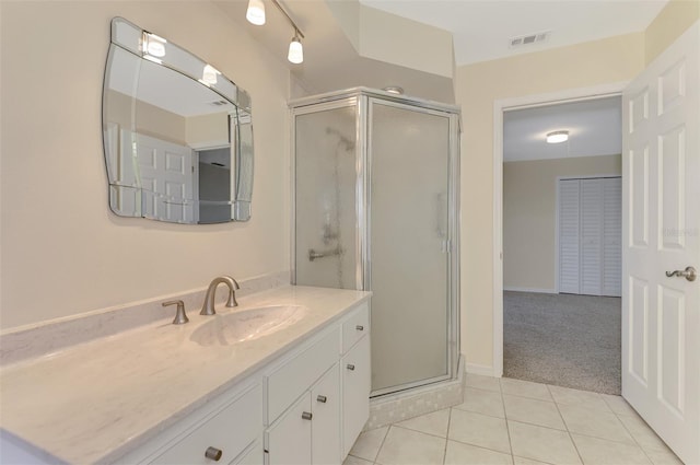 5124 Palm Aire Dr, Sarasota, FL 34243 - full bath featuring a shower stall, vanity, and tile patterned floors