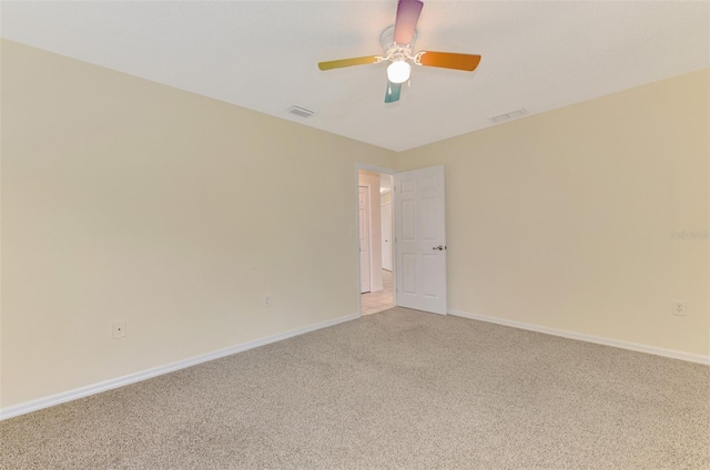 5124 Palm Aire Dr, Sarasota, FL 34243 - unfurnished room featuring light colored carpet and ceiling fan