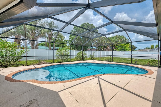 5124 Palm Aire Dr, Sarasota, FL 34243 - view of pool with a patio, a fenced backyard, and a lanai