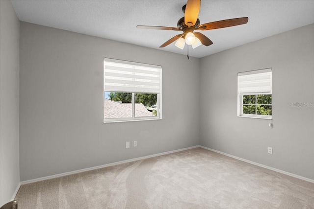 11839 Shrewsbury Ln, Parrish, FL 34219 - spare room featuring carpet flooring and ceiling fan