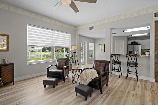 11839 Shrewsbury Ln, Parrish, FL 34219 - sitting room featuring light wood-style flooring and a ceiling fan
