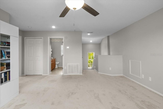 11839 Shrewsbury Ln, Parrish, FL 34219 - unfurnished living room featuring carpet, a ceiling fan, and recessed lighting