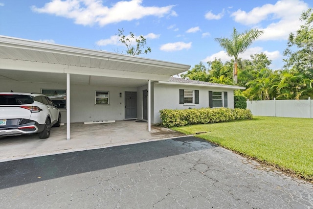 2115 9th Ave W Unit 3D, Bradenton, FL 34205 - view of front facade with stucco siding and covered parking
