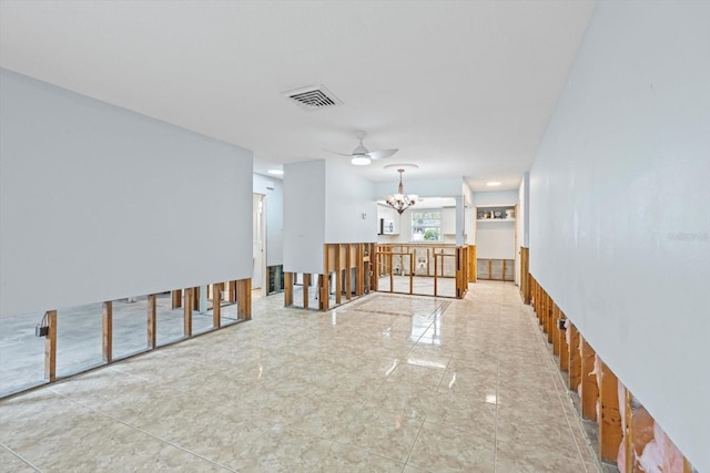 2115 9th Ave W Unit 3D, Bradenton, FL 34205 - spare room featuring a chandelier