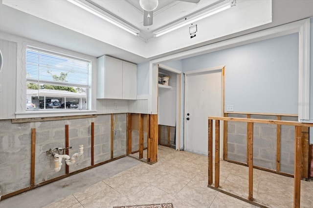 2115 9th Ave W Unit 3D, Bradenton, FL 34205 - bar area with light tile patterned floors and ceiling fan