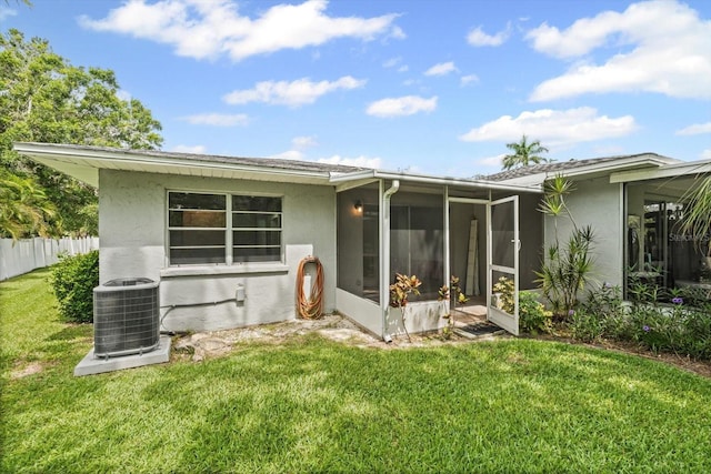 2115 9th Ave W Unit 3D, Bradenton, FL 34205 - back of property featuring stucco siding and a sunroom
