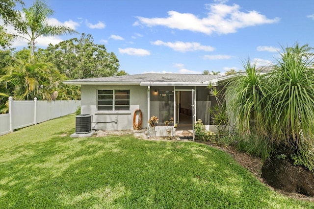 2115 9th Ave W Unit 3D, Bradenton, FL 34205 - rear view of property with a sunroom and stucco siding