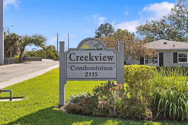 2115 9th Ave W Unit 3D, Bradenton, FL 34205 - community sign with a yard