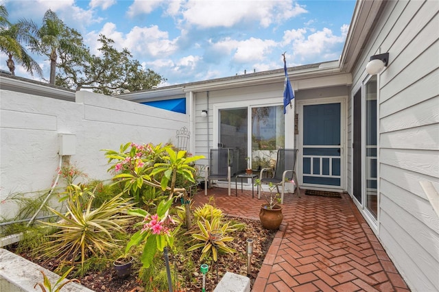 805 Waterside Ln, Bradenton, FL 34209 - doorway to property featuring a patio area