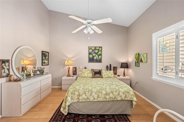 805 Waterside Ln, Bradenton, FL 34209 - bedroom featuring high vaulted ceiling, light wood-type flooring, and ceiling fan
