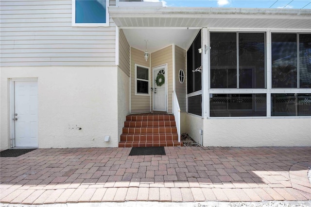 1801 Highland Rd, Osprey, FL 34229 - doorway to property with stucco siding